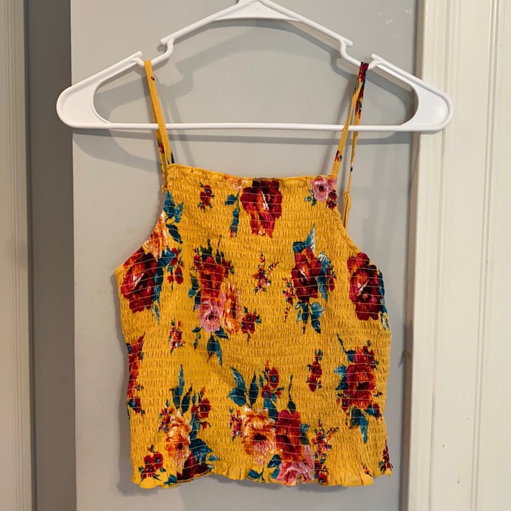 Woman’s cropped yellow tank